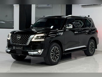 Nissan  Patrol  Platinum  2023  Automatic  33,000 Km  6 Cylinder  Four Wheel Drive (4WD)  SUV  Black  With Warranty