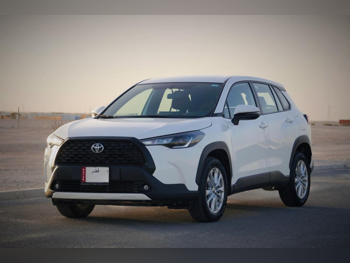 Toyota  Corolla  2023  Automatic  22,000 Km  4 Cylinder  Front Wheel Drive (FWD)  Sedan  White  With Warranty