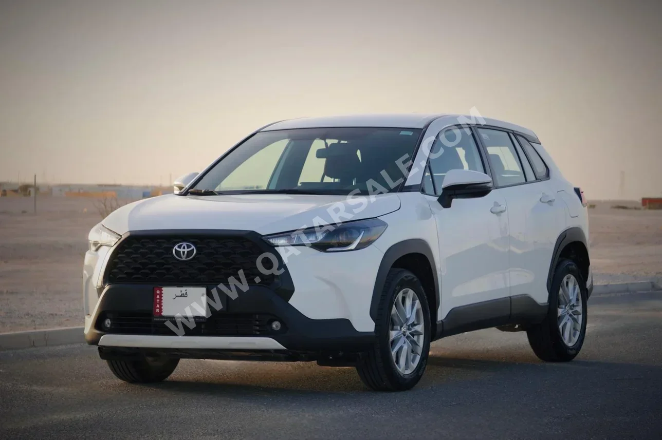 Toyota  Corolla  2023  Automatic  22,000 Km  4 Cylinder  Front Wheel Drive (FWD)  Sedan  White  With Warranty