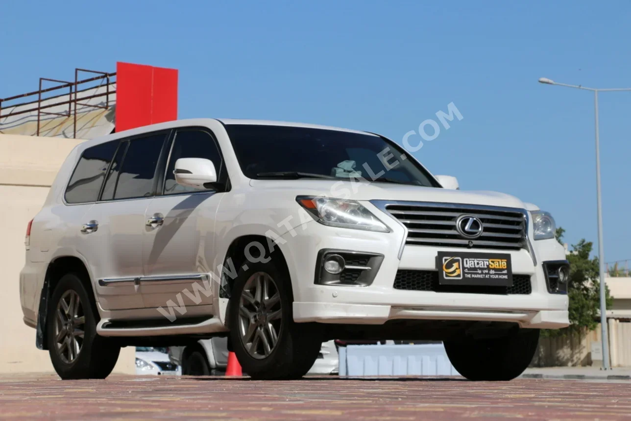 لكزس ال اكس 570 2014 اوتوماتيك 295,000 كم 8 سلندر دفع رباعي اس يو في أبيض