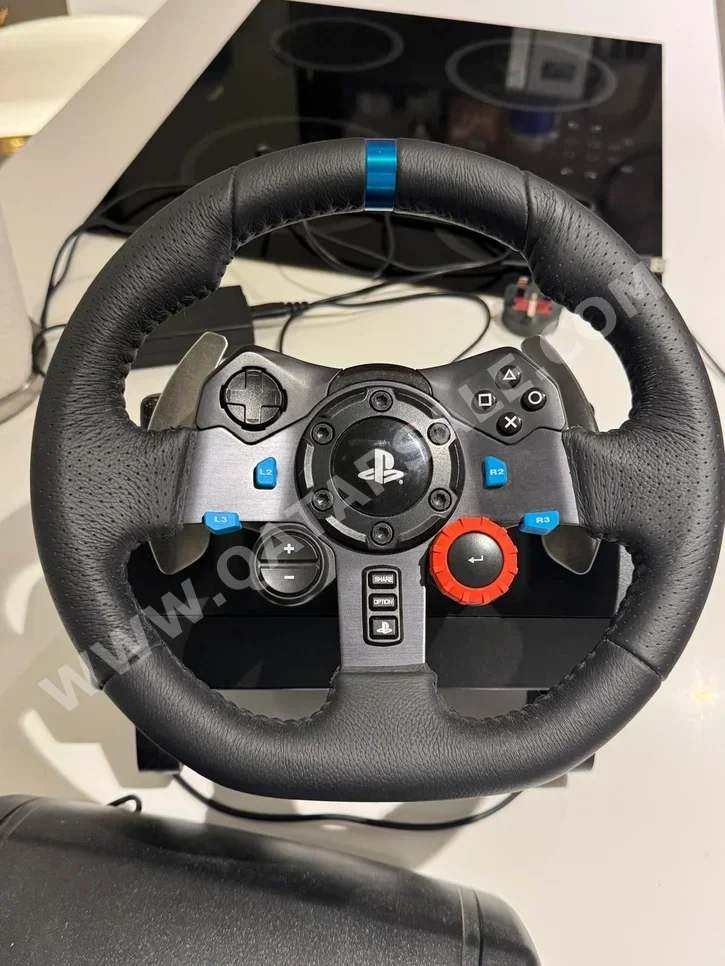 ملحقات اجهزة العاب الفيديو عجلة القيادة مع مغير السرع  - لوجيتك  - جي 29  - أسود