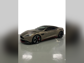 Aston Martin  Vanquish  2017  Automatic  77,000 Km  12 Cylinder  Four Wheel Drive (4WD)  Coupe / Sport  Bronze  With Warranty