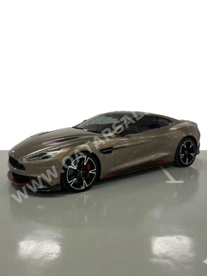 أستون مارتن  فانكوش  2017  اوتوماتيك  77,000 كم  12 سلندر  دفع رباعي  كوبيه \ سبورت  برونزي  تحت الضمان