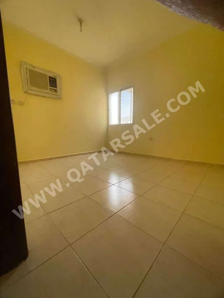 2 Bedrooms  Apartment  For Rent  in Doha -  Madinat Khalifa South  Not Furnished