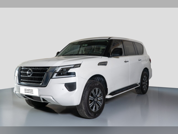 نيسان  باترول  أكس أي  2020  اوتوماتيك  100,000 كم  6 سلندر  دفع رباعي  اس يو في  أبيض