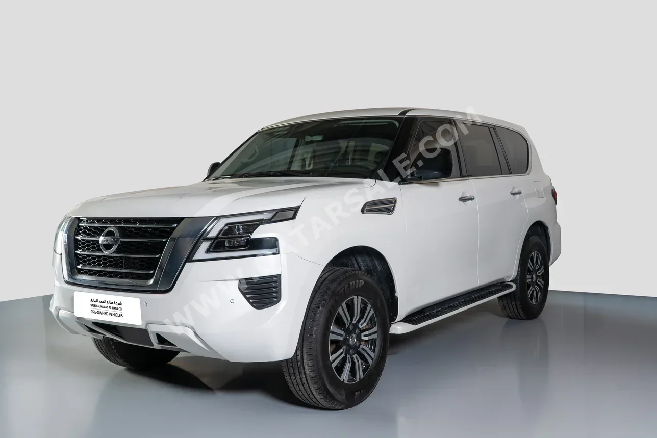 نيسان  باترول  أكس أي  2020  اوتوماتيك  100,000 كم  6 سلندر  دفع رباعي  اس يو في  أبيض