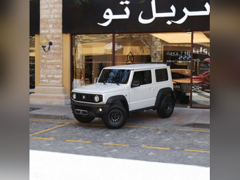 سوزوكي  جمني  2026  اوتوماتيك  970 كم  4 سلندر  دفع رباعي  اس يو في  أبيض  تحت الضمان