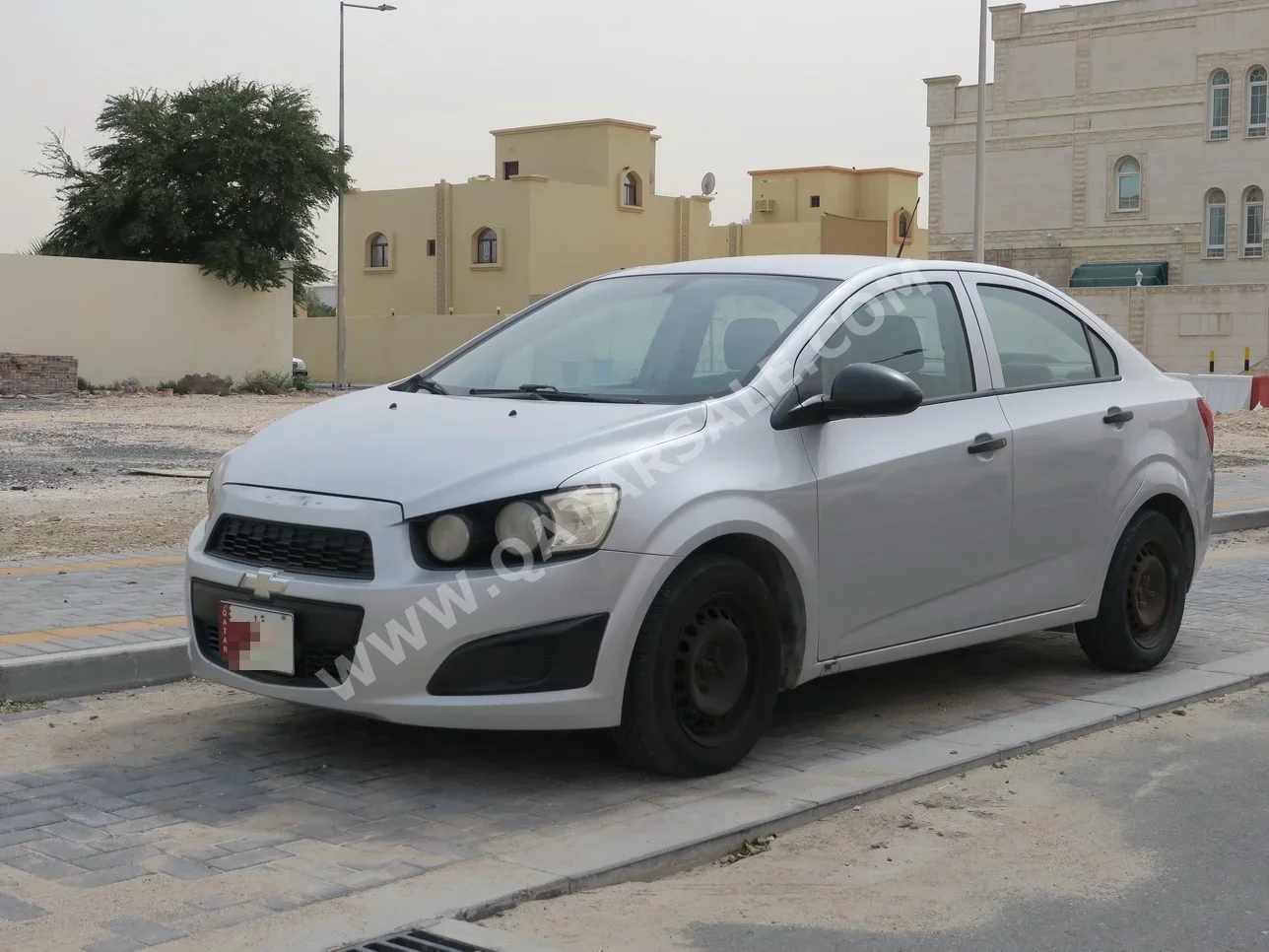 شفروليه سونيك 2016 اوتوماتيك 114,000 كم 4 سلندر سحب امامي سيدان فضي