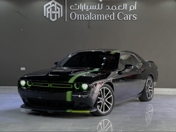 دودج  تشالنجر  ار/تي  2022  اوتوماتيك  120,000 كم  8 سلندر  دفع خلفي  كوبيه \ سبورت  اسود و اخضر