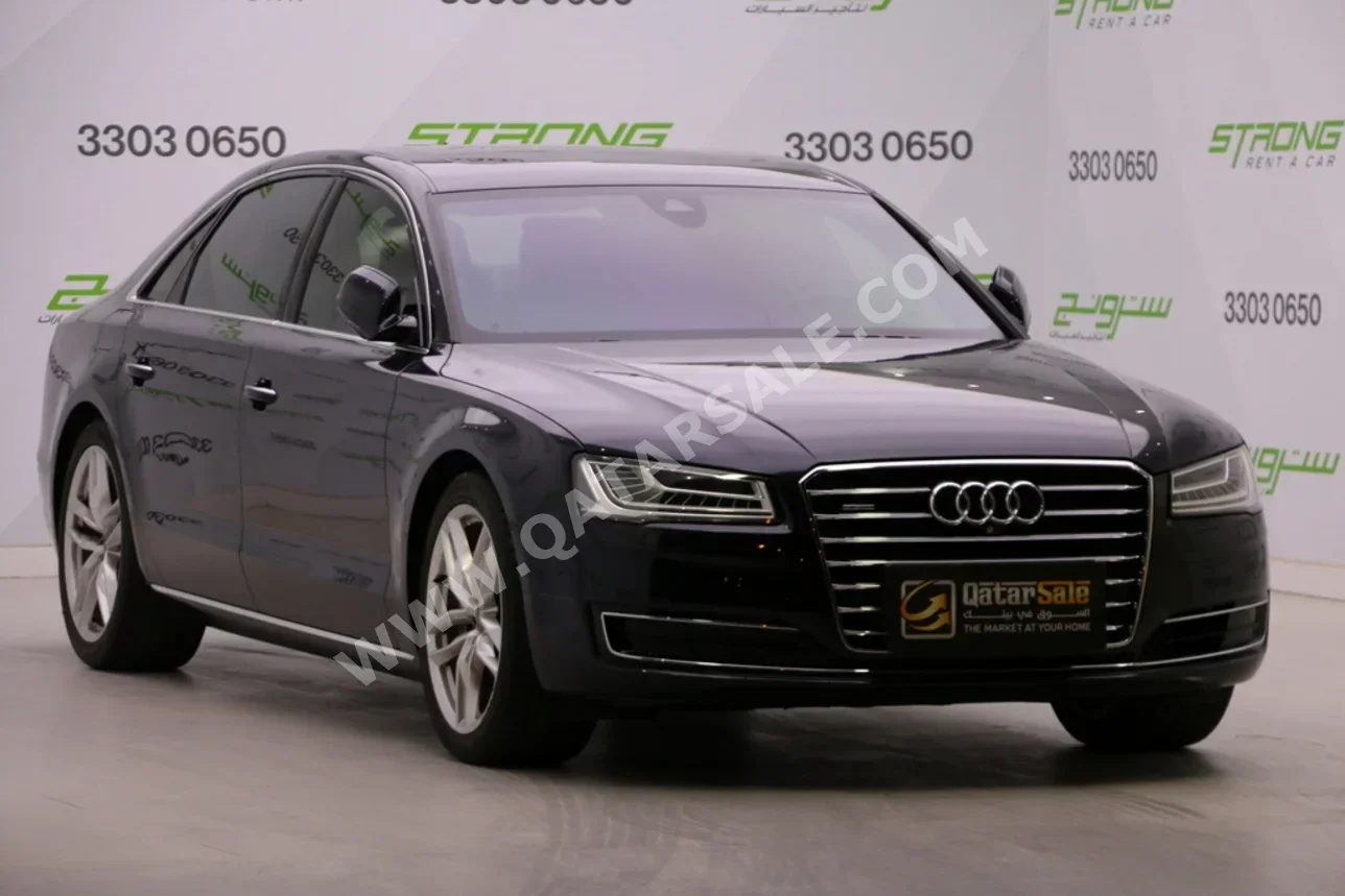 اودي أي 8 أل 2016 اوتوماتيك 62,000 كم 6 سلندر دفع كلي مستمر سيدان أزرق غامق