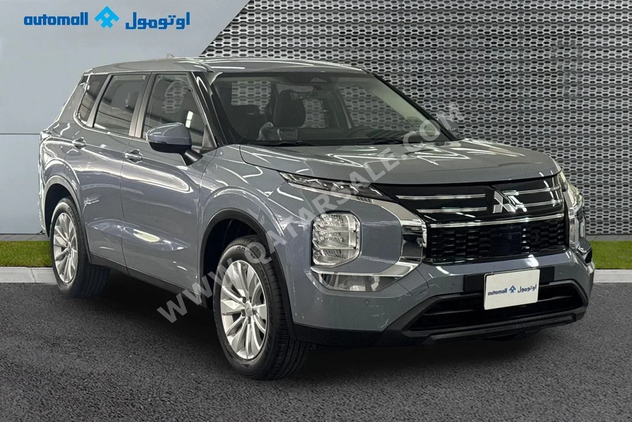 ميتسوبيشي  أوت لاندر  2026  اوتوماتيك  560 كم  4 سلندر  سحب امامي  اس يو في  رمادي  تحت الضمان