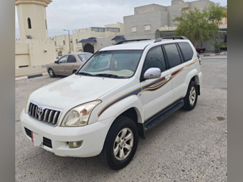 تويوتا  برادو  في اكس  2009  اوتوماتيك  440,000 كم  6 سلندر  دفع رباعي  اس يو في  أبيض لؤلؤي