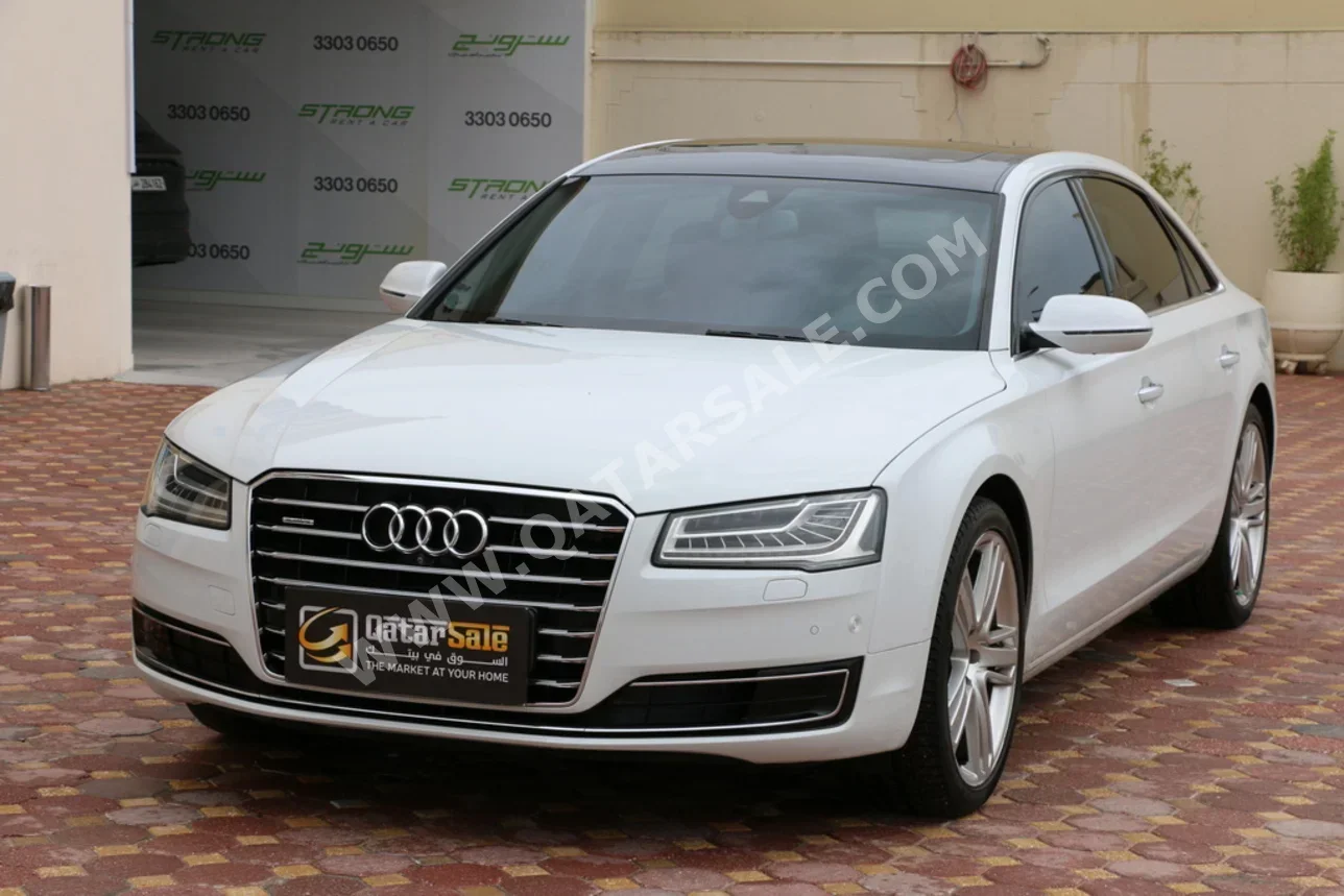 Audi  A8  L  2015  Automatic  134,000 Km  6 Cylinder  All Wheel Drive (AWD)  Sedan  White and Black