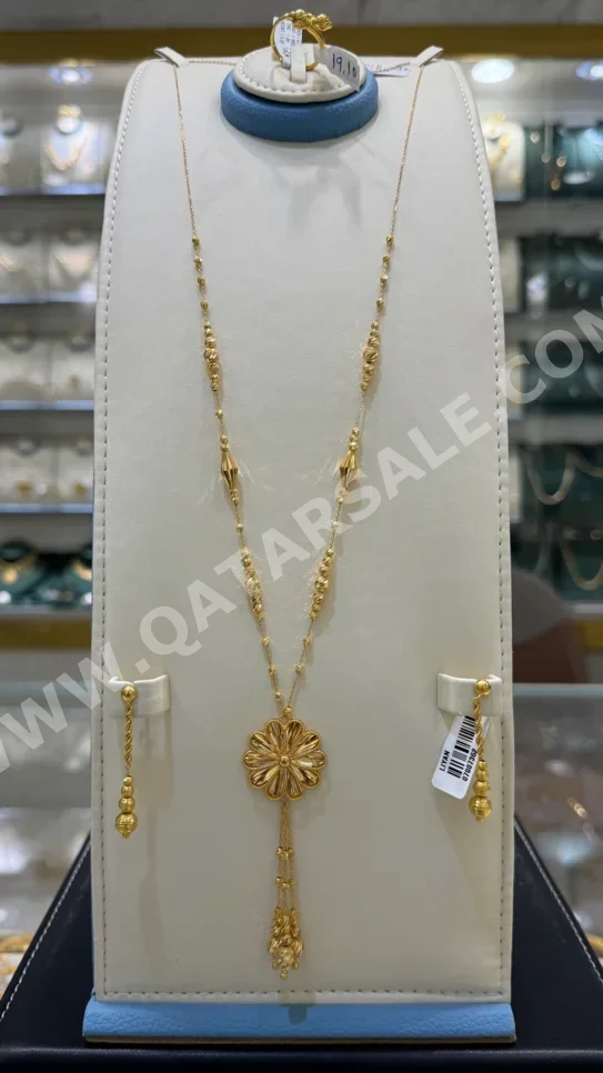 الذهب طقم  ايطاليا  نسائي  حسب القطعة ( ديزاينرز)  بدون حجر  ضمان الصيانة  توصيل مجاني  ذهب أصفر  عيار 21