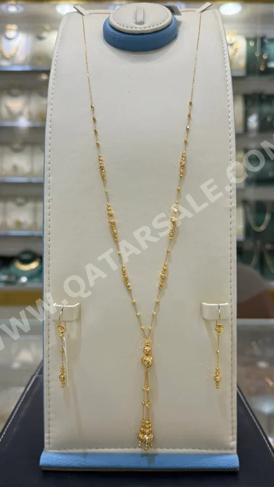 الذهب طقم  ايطاليا  نسائي  حسب القطعة ( ديزاينرز)  بدون حجر  ضمان الصيانة  توصيل مجاني  ذهب أصفر  عيار 21