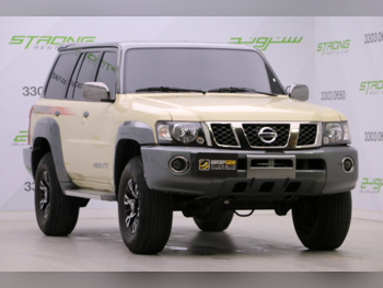 Nissan  Patrol  Super Safari  2023  Automatic  80,000 Km  6 Cylinder  Four Wheel Drive (4WD)  SUV  Beige  With Warranty