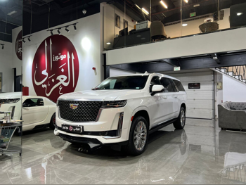 Cadillac  Escalade  Platinum  2023  Automatic  52,000 Km  8 Cylinder  Four Wheel Drive (4WD)  SUV  Pearl  With Warranty