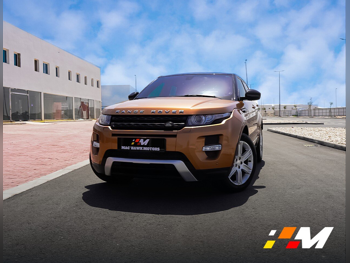 Land Rover  Evoque  Dynamic  2015  Automatic  136,000 Km  4 Cylinder  Four Wheel Drive (4WD)  SUV  Bronze