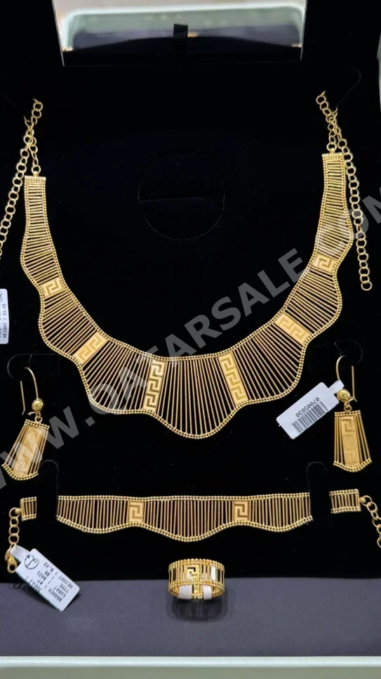 الذهب طقم  البحرين  نسائي  حسب الوزن  39.88 غرام  بدون حجر  ضمان الصيانة  توصيل مجاني  ذهب أصفر  عيار 21