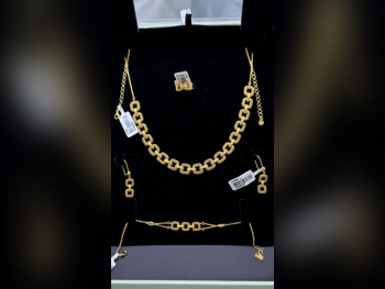 الذهب طقم البحرين نسائي حسب الوزن 29.96 غرام بدون حجر ضمان الصيانة توصيل مجاني ذهب أصفر عيار 21