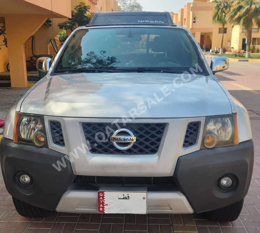 Nissan  Xterra  Off Road  2011  Automatic  128,000 Km  6 Cylinder  Four Wheel Drive (4WD)  SUV  Silver