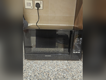 Microwaves - Sharp  - Black