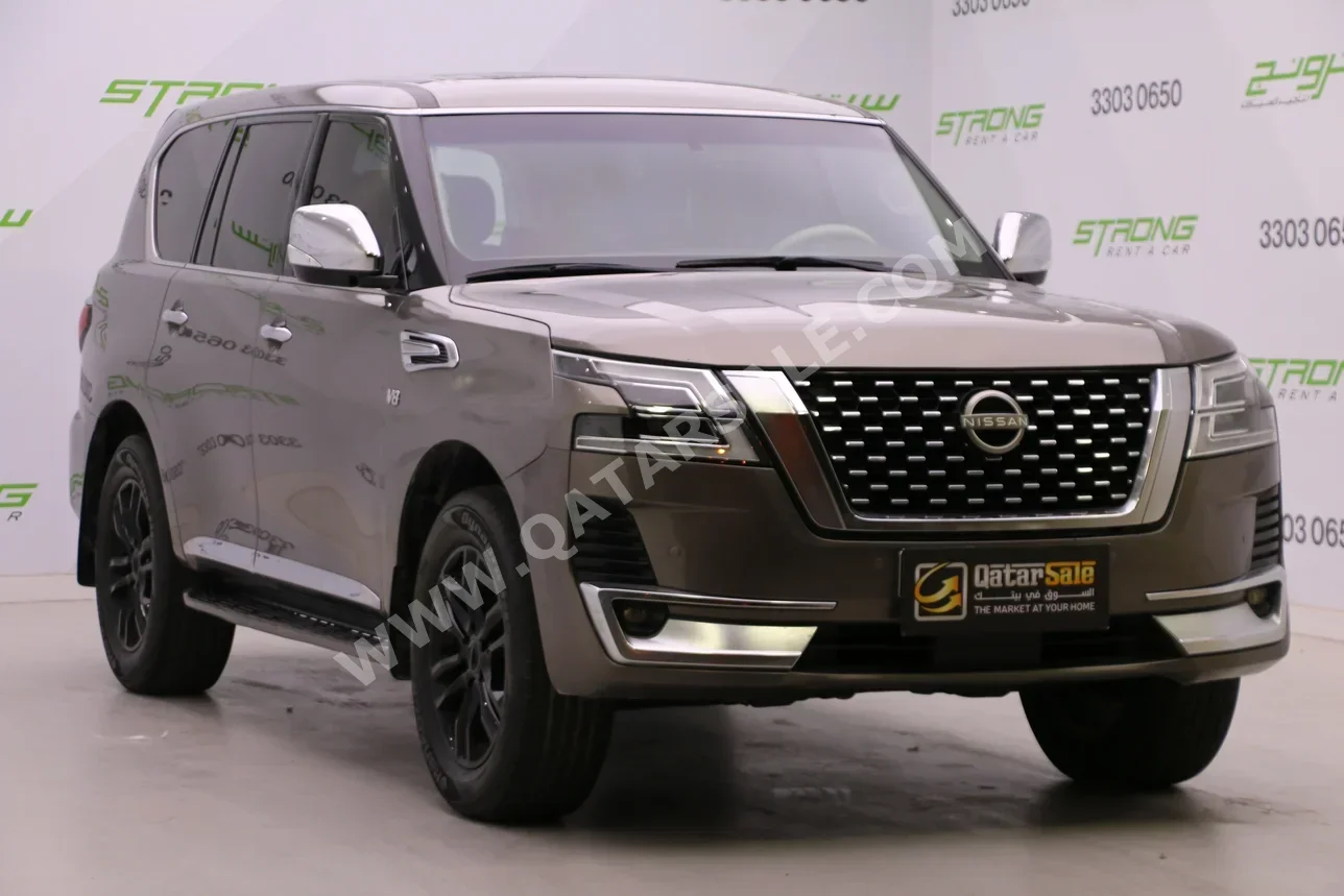 Nissan  Patrol  Platinum  2013  Automatic  237,000 Km  8 Cylinder  Four Wheel Drive (4WD)  SUV  Gray