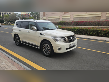 نيسان  باترول  ال اي بلاتينيوم  2015  اوتوماتيك  202,000 كم  8 سلندر  دفع رباعي  اس يو في  أبيض