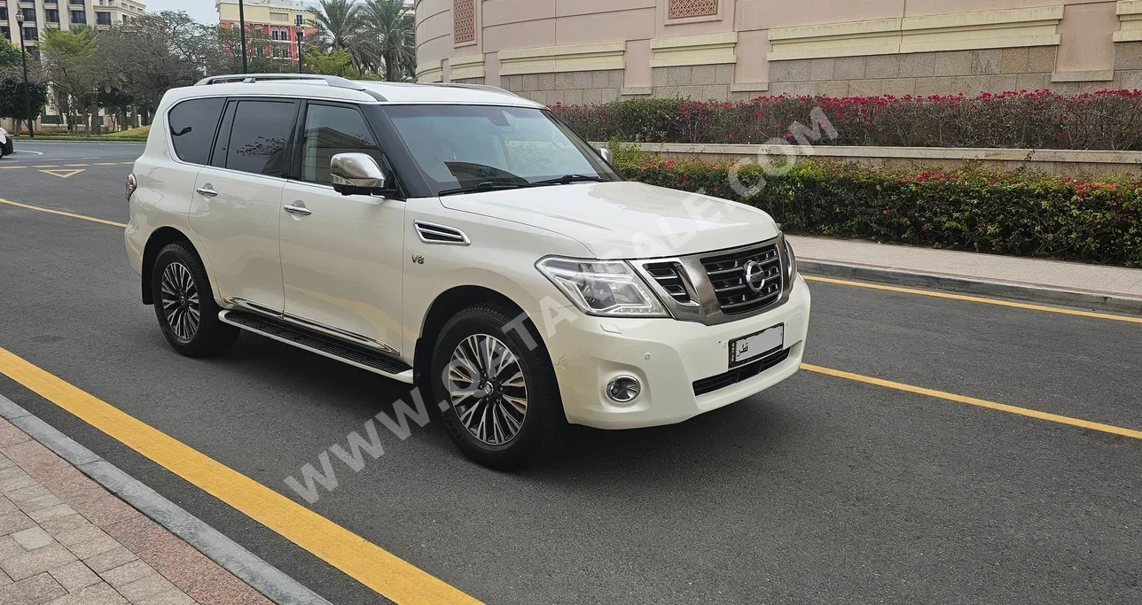 Nissan  Patrol  LE Platinum  2015  Automatic  202,000 Km  8 Cylinder  Four Wheel Drive (4WD)  SUV  White