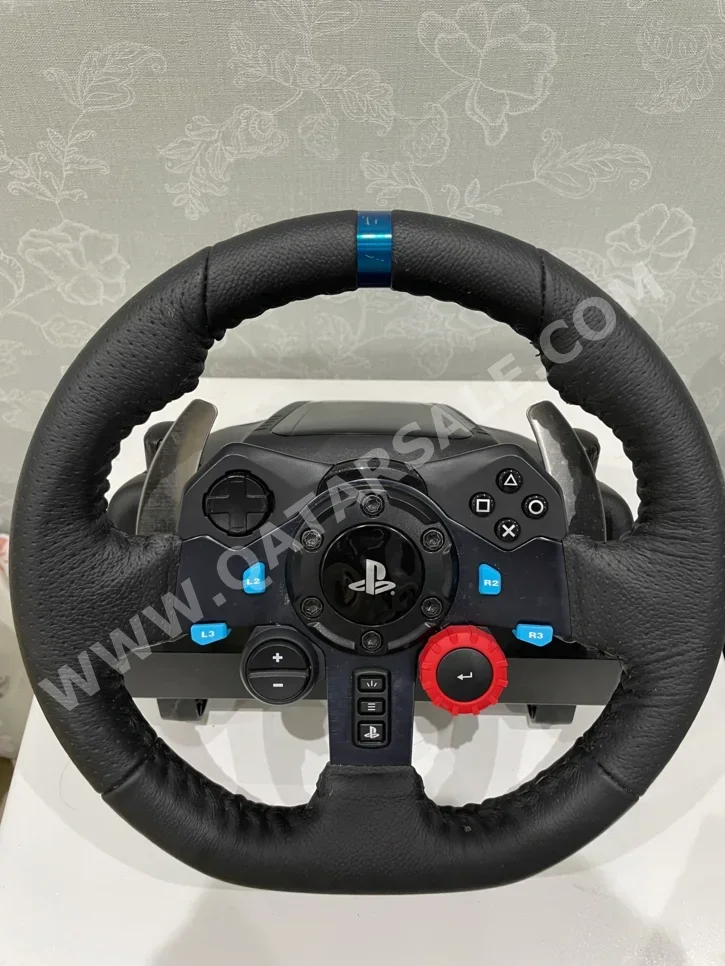 ملحقات اجهزة العاب الفيديو عجلة القيادة مع مغير السرع  - لوجيتك  - جي 29  - أسود