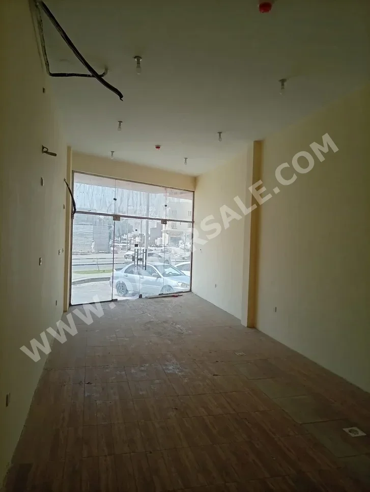 Commercial Shops - Not Furnished  - Umm Salal  For Rent  - Al Kharaitiyat