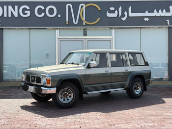 نيسان  باترول  سوبر سفاري  1993  اوتوماتيك  109,000 كم  6 سلندر  دفع رباعي  اس يو في  اخضر وذهبي
