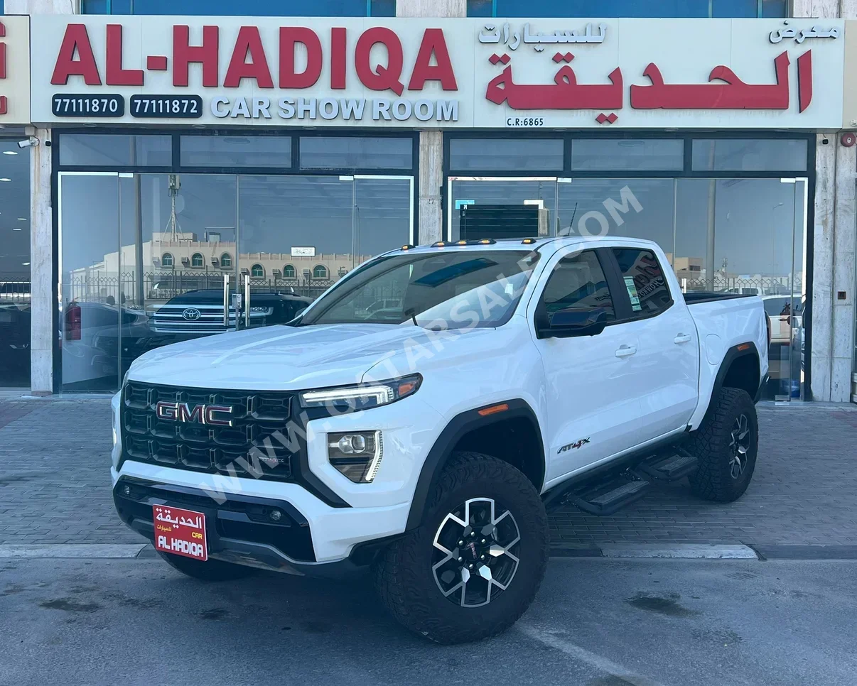 جي ام سي  كانيون  اي تي 4 اكس  2024  اوتوماتيك  7,000 كم  4 سلندر  دفع رباعي  بيكب  أبيض