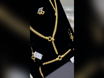 Gold Set  Bahrain  Woman  By Weight  28.32 Gram  Without Stone  Maintenance Warranty  Free Shipping  Yellow Gold  21k