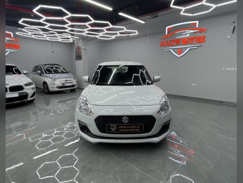 Suzuki  Swift  2020  Automatic  88,000 Km  4 Cylinder  Front Wheel Drive (FWD)  Hatchback  White