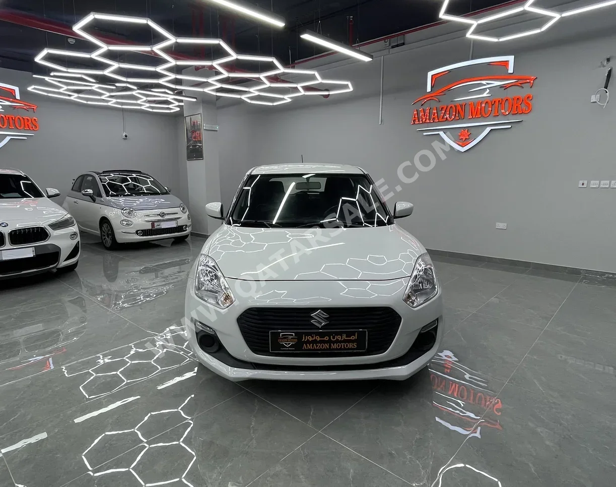 سوزوكي  سويفت  2020  اوتوماتيك  88,000 كم  4 سلندر  سحب امامي  هاتشباك  أبيض
