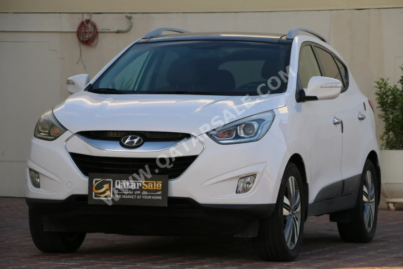 هيونداي  تكسن  لميتد  2015  اوتوماتيك  85,000 كم  4 سلندر  دفع رباعي  اس يو في  أبيض