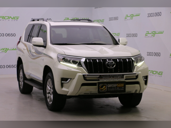 تويوتا  برادو  تي اكس ال  2021  اوتوماتيك  38,030 كم  6 سلندر  دفع رباعي  اس يو في  أبيض لؤلؤي