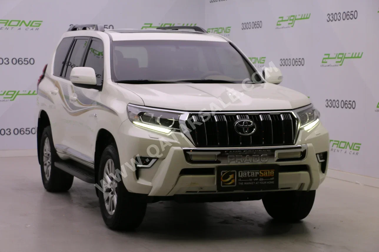 تويوتا  برادو  تي اكس ال  2021  اوتوماتيك  38,030 كم  6 سلندر  دفع رباعي  اس يو في  أبيض لؤلؤي