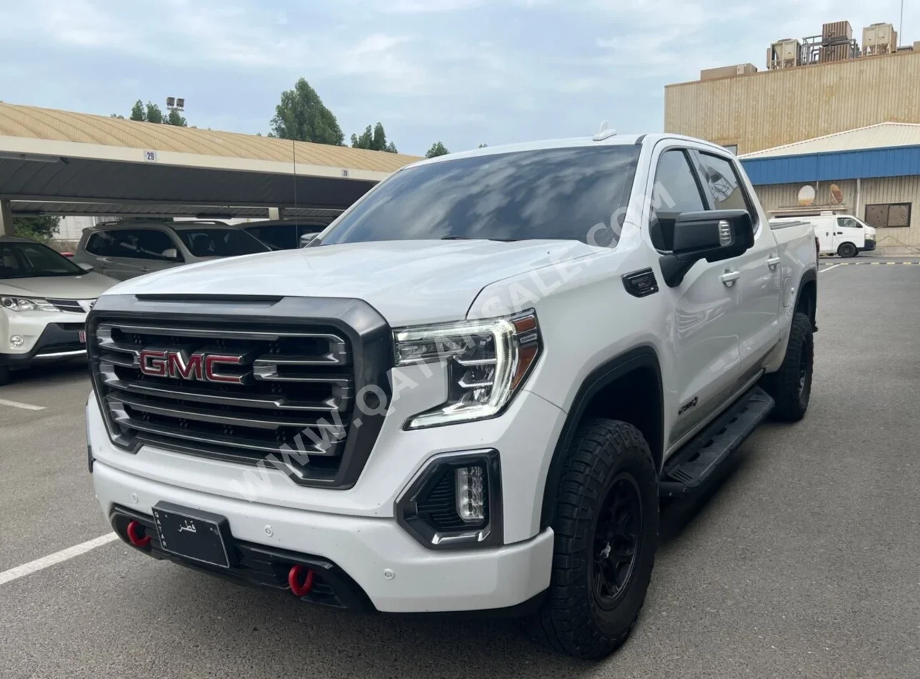 GMC  Sierra  AT4 Carbon Pro  2021  Automatic  105,000 Km  8 Cylinder  Four Wheel Drive (4WD)  Pick Up  White