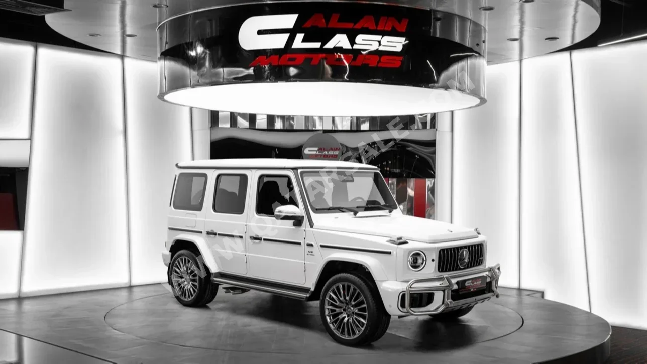 مرسيدس - بنز  جي - كلاس  63 اي ام جي  2025  اوتوماتيك  17,960 كم  8 سلندر  دفع رباعي  اس يو في  أبيض