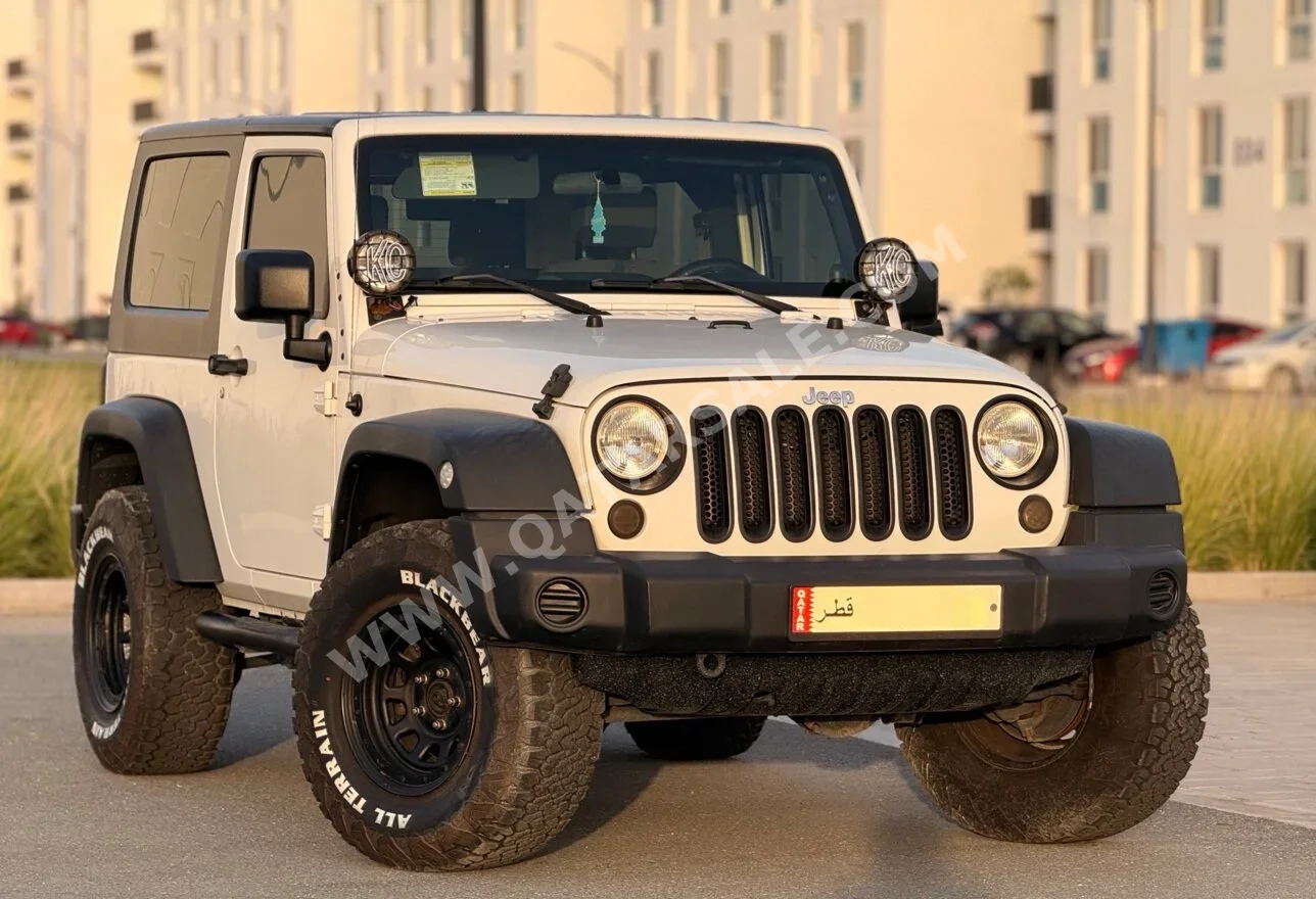 Jeep  Wrangler  Sport  2009  Manual  84,500 Km  6 Cylinder  Four Wheel Drive (4WD)  SUV  White