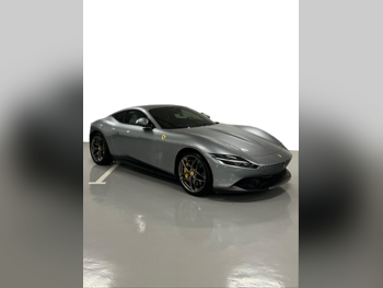 Ferrari  Roma  2023  Automatic  3,000 Km  8 Cylinder  Rear Wheel Drive (RWD)  Coupe / Sport  Gray  With Warranty