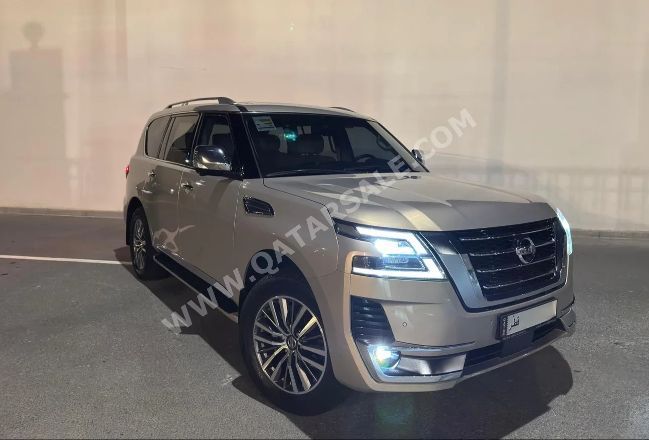 Nissan  Patrol  Platinum  2021  Automatic  94,000 Km  6 Cylinder  All Wheel Drive (AWD)  SUV  Beige  With Warranty