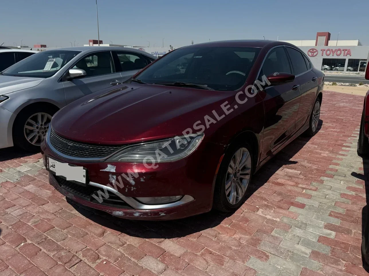 كرايسلر 200C 2016 اوتوماتيك 150,000 كم 4 سلندر دفع خلفي سيدان عنابي