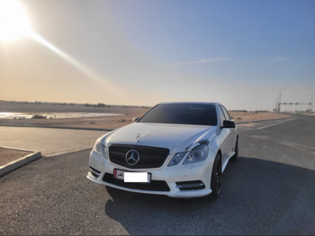 Mercedes-Benz  E-Class  350  2013  Automatic  121,000 Km  4 Cylinder  Rear Wheel Drive (RWD)  Sedan  White