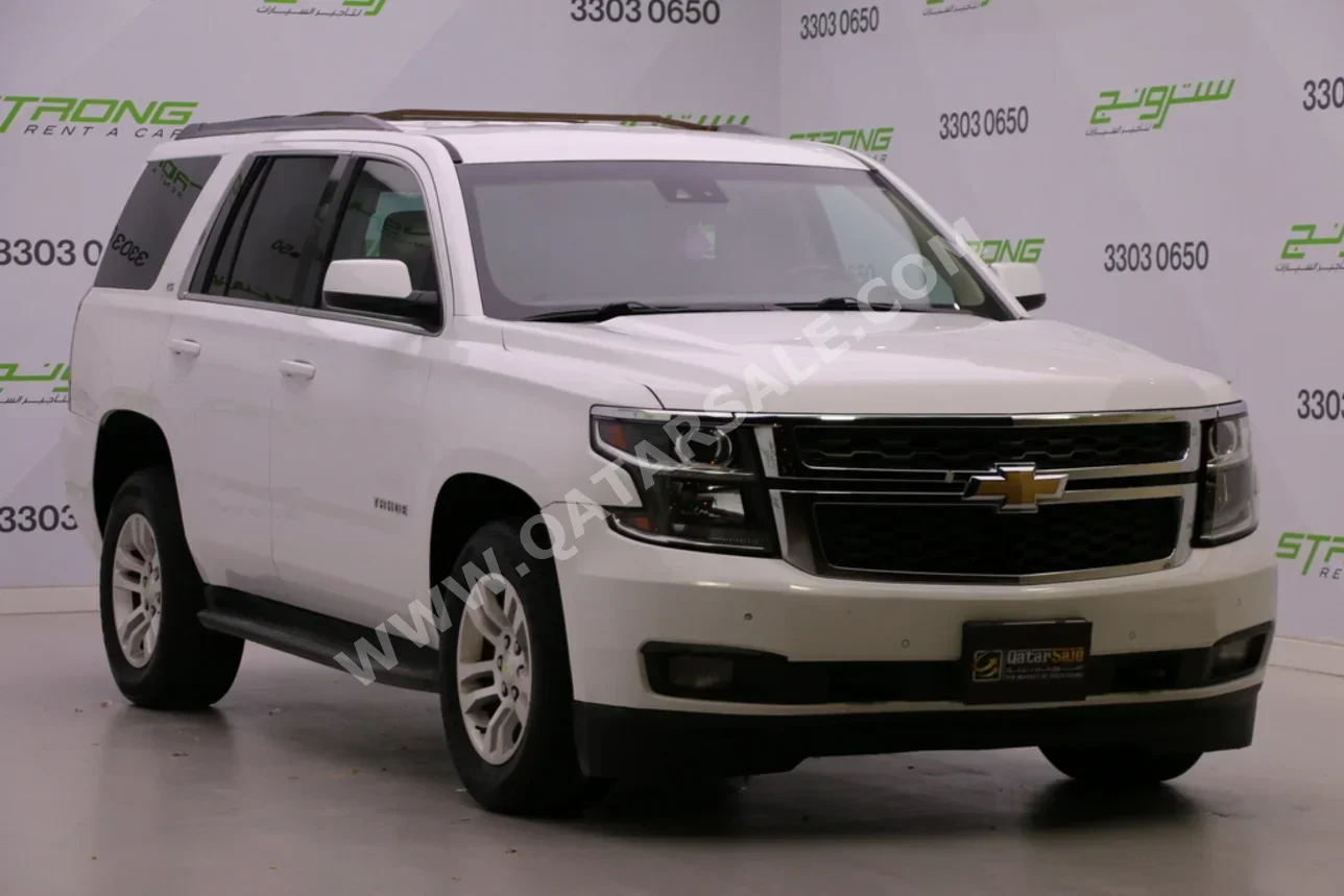 Chevrolet  Tahoe  LS  2015  Automatic  286,000 Km  8 Cylinder  Rear Wheel Drive (RWD)  SUV  White