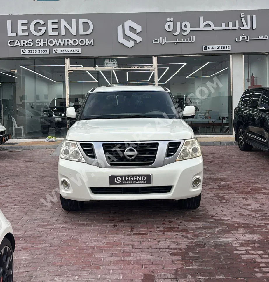 نيسان  باترول  ال اي  2012  اوتوماتيك  321,000 كم  8 سلندر  دفع رباعي  اس يو في  أبيض لؤلؤي