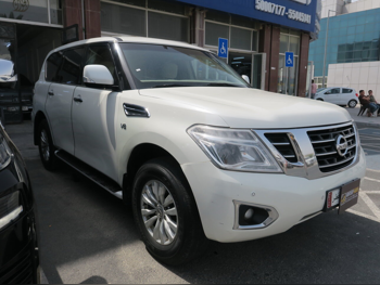 Nissan  Patrol  SE  2014  Automatic  225,000 Km  8 Cylinder  Four Wheel Drive (4WD)  SUV  White