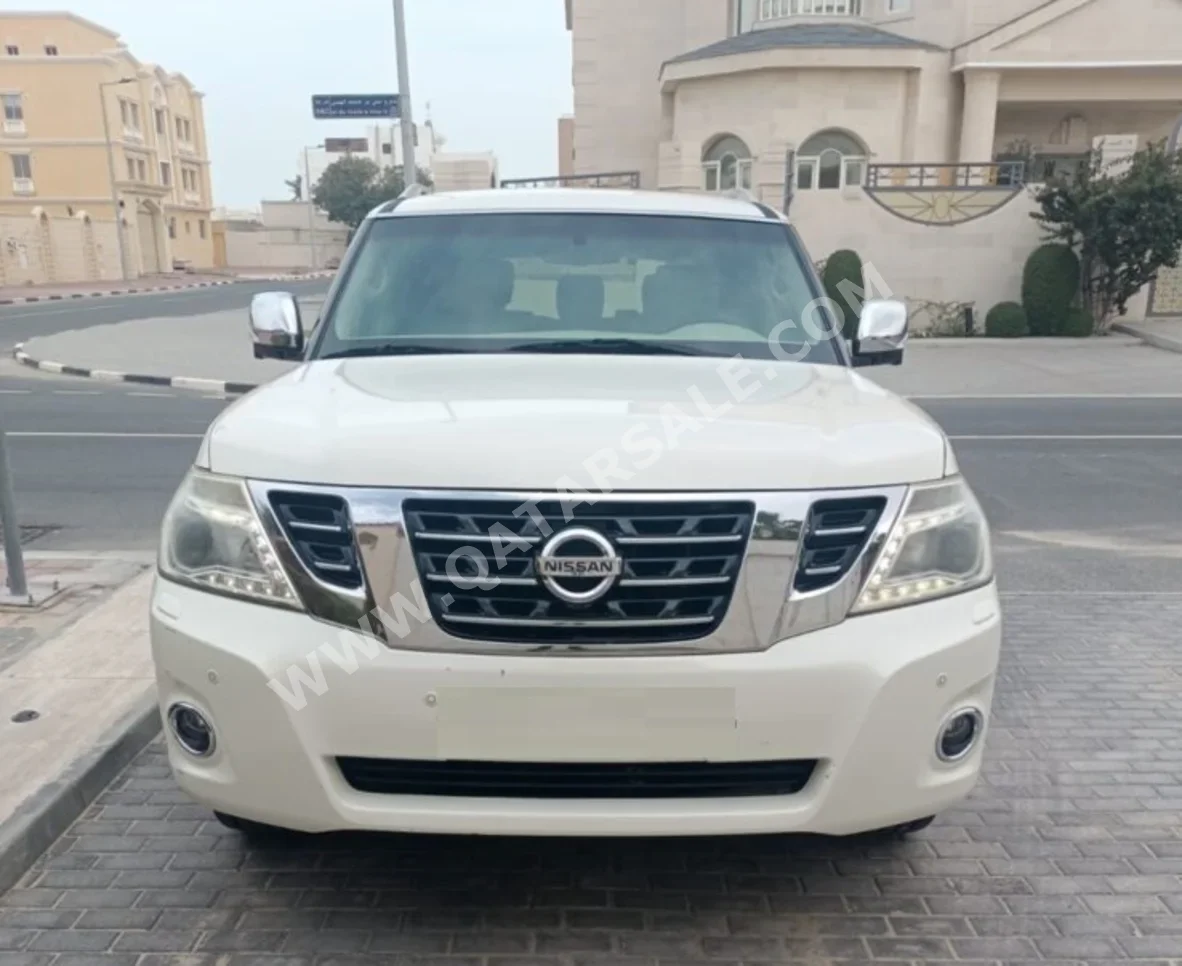Nissan Patrol Platinum 2015 Automatic 290,000 Km 8 Cylinder Four Wheel Drive (4WD) SUV White